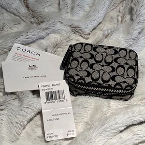 Coach travel medication holder